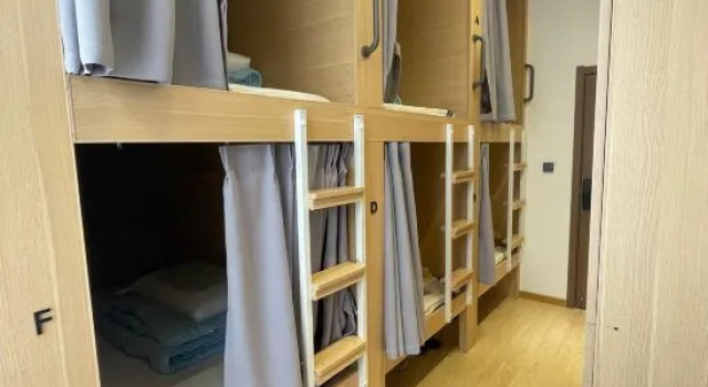 Кровать в общем номере (женский номер) Chaoge Youth Hostel (Dali Ancient Town South Gate)