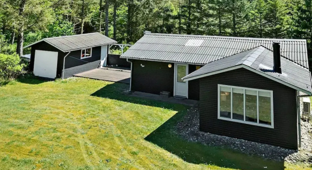 Коттедж 4 person holiday home in Løkken