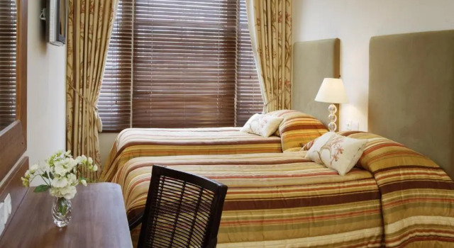 Четырёхместный номер Standard New Linden Hotel