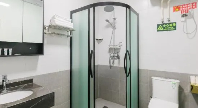 Кровать в общем номере Jiaozhou Yiyun Hotel (Qingdao Jiaodong International Airport)