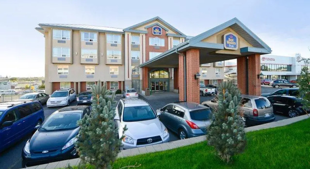 Кровать в общем номере Best Western PLUS Calgary Centre Inn