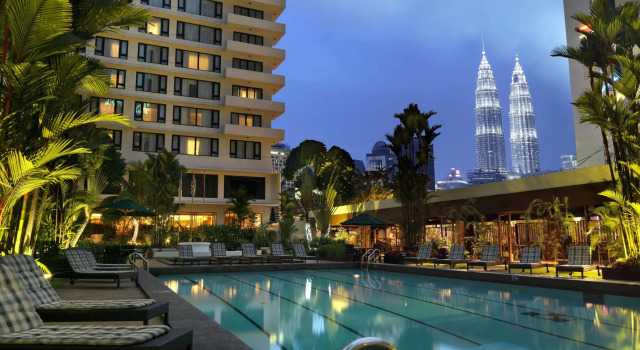 Кровать в общем номере The Federal Kuala Lumpur