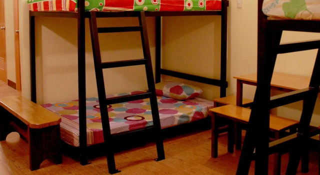 Кровать в общем номере Happy Turtle Hostel