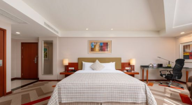 Номер Deluxe Merryland Traders Hotel