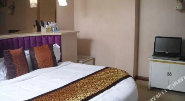 Xingqijiu Business Hotel, Rezervovat Hotel Jang-čou 
