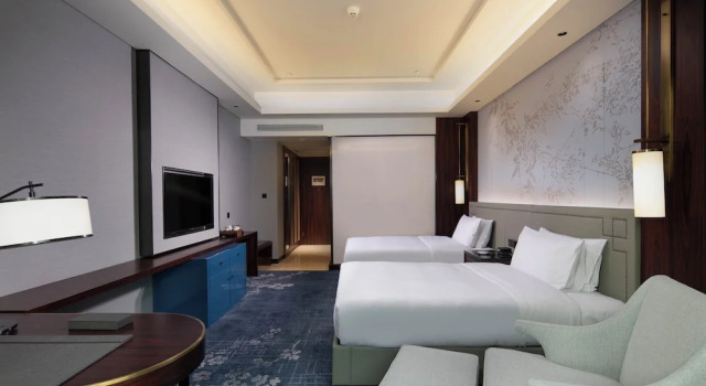Четырёхместный клубный номер Standard HUALUXE Leshan by IHG