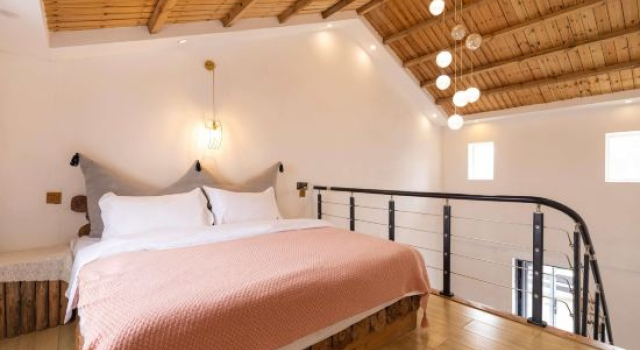 Кровать в общем номере с 6 комнатами с видом на внутренний двор Weizhou Island Dudu's Banhai Homestay (Xijiao Wharf)
