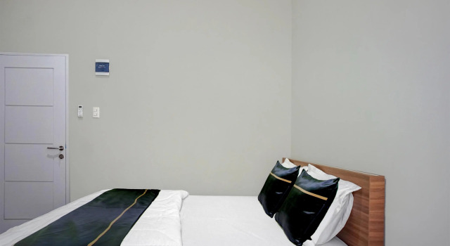 Номер Deluxe Collection O near Museum Tsunami Banda Aceh formerly Blower Residence