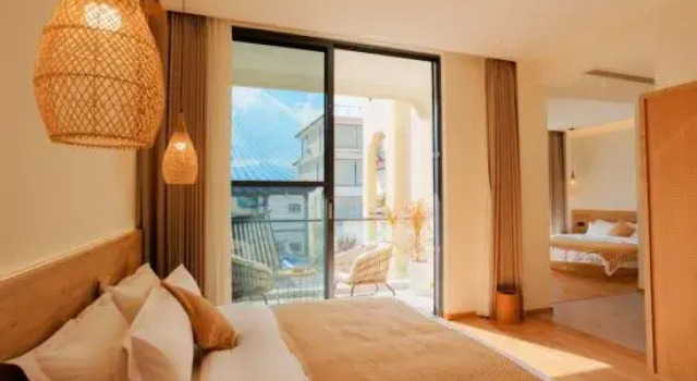 Семейный люкс с балконом и с красивым видом из окна Qieman Yuelai Homestay (Erhai Xiaoputu Branch)
