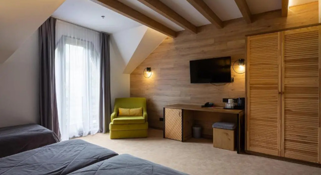 Трёхместный полулюкс Bukovel Hotel