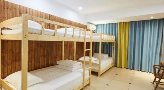 Кровать в общем номере Guiyuan Tianqiaoshe Smart Hotel (Wenchang Middle School)