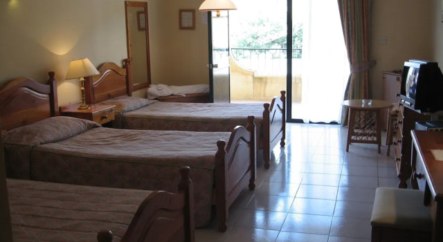Standardní Třílůžkový pokoj Cornucopia Hotel
