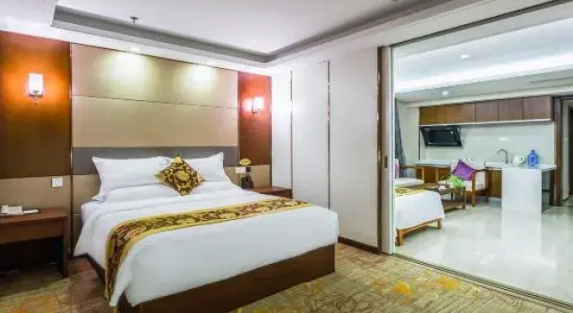 Семейный люкс Deluxe Qingdao Xinlong Grand Hotel (Jinshatan)