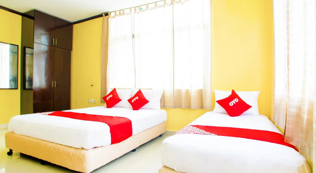 Кровать в общем номере Hotel O Bbk