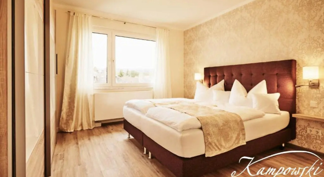 Апартаменты Deluxe Kampowski Apartments Deluxe