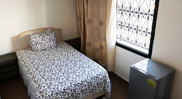 Четырёхместный номер Economy с 4 комнатами Regency Park and Suites