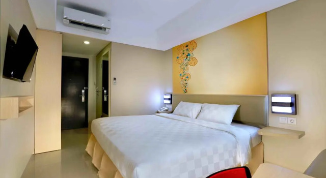 Negócio quarto Cordela Hotel Cirebon