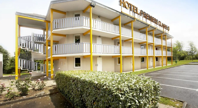 Кровать в общем номере Hotel du Parc - Chantepie