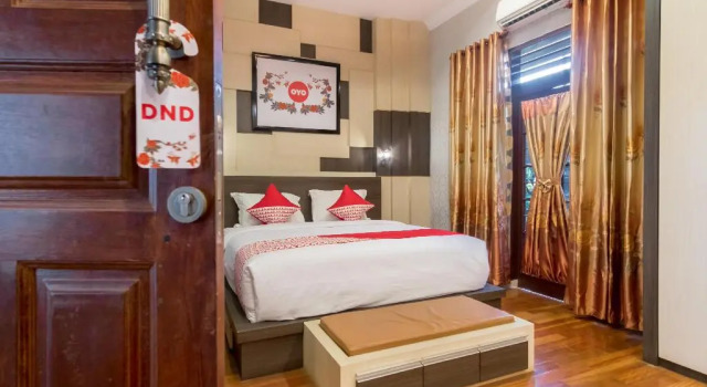 Номер Deluxe OYO 619 Naufal Guest House Syariah