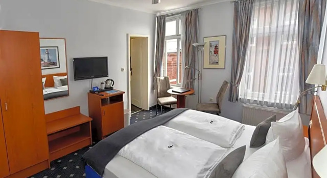 Hotel Stadt Hamburg, Забронировать Отель Отели и гостиницы Хайлигенхафен, Отель