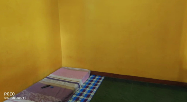 Кровать в общем номере Homestay Ngudi