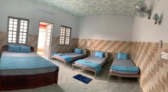 Кровать в общем номере Nam Cat Tien Homestay
