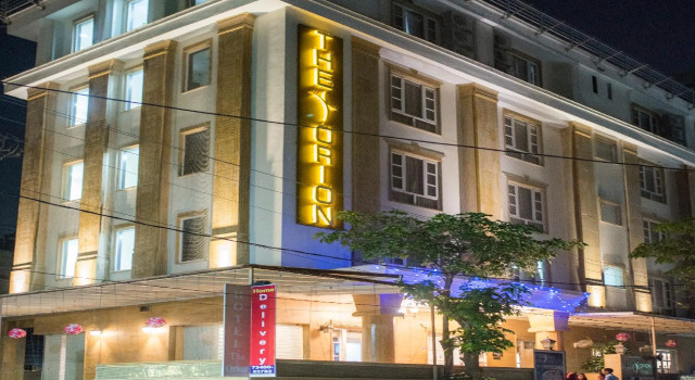 Кровать в общем номере Hotel The Orion