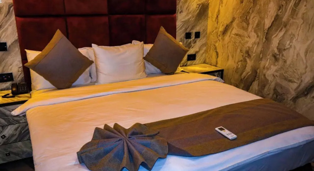 Четырёхместный номер Deluxe с видом на бассейн Mcdons Skye Hotel