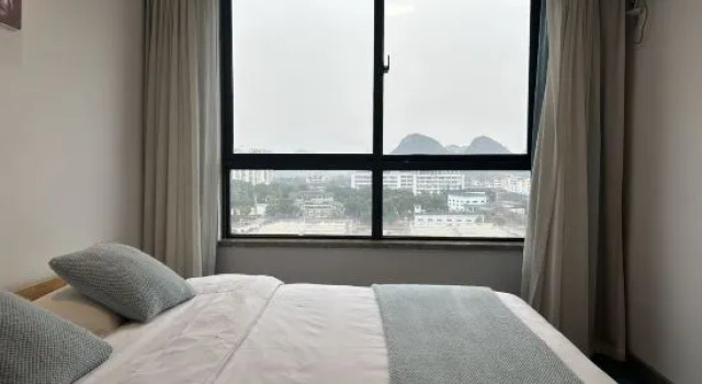 Люкс с видом на горы Guilin Fanfan Shexia Apartment (High-tech Wanda Plaza)