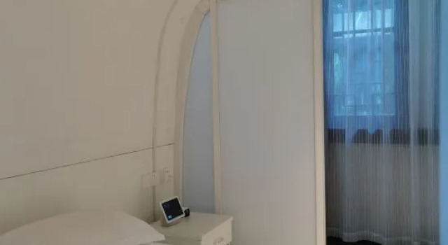Капсула Huayi Jiankang Hotel