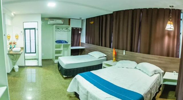 SEGUNDA CASA - Seu cantinho em Guarapari, 1 minuto a pé da Praia do Morro! Suítes confortáveis e modernas - Para casal ou para grupos de até 4 pessoas, Забронировать Отель Гуарапари Эспириту-Санту, рядом с Culture House