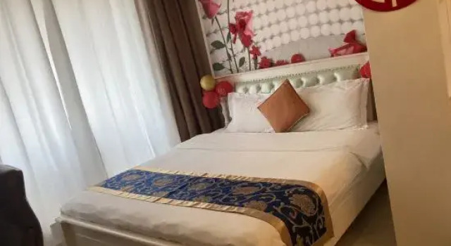 Люкс He Long Town Story Express hotel