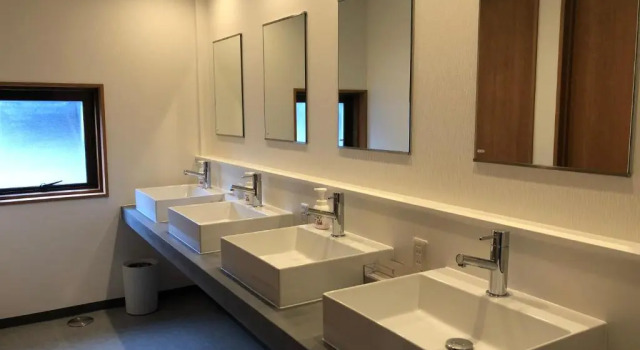 Кровать в общем номере Kona Stay Izu Nagaoka