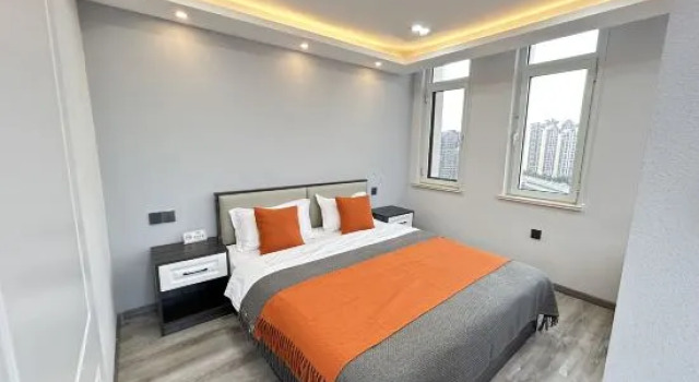 Люкс Qingdao Chujian. Yijia Preferred Hotel (Golden Beach Wuyue Plaza)
