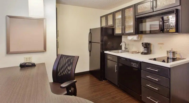 Кровать в общем номере Sonesta Simply Suites Somerset