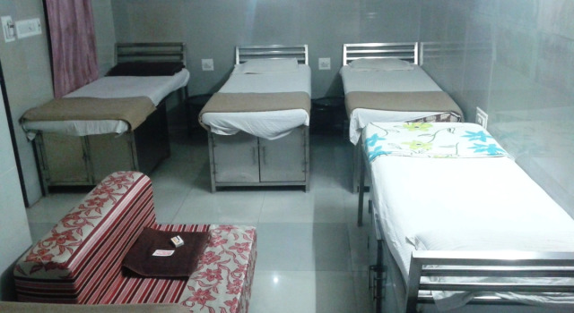 Кровать в общем номере Hotel Chatako