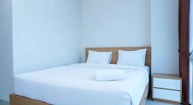Standard Zimmer Homey and Modern 2BR Apartment at Atlanta Residence
