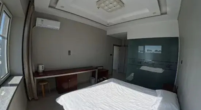 Люкс Deluxe Xincheng Yangguang Business Apartment
