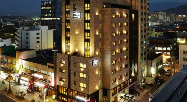 Кровать в общем номере Urban Island Hotel Jeju