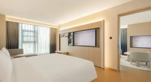 Люкс Deluxe JI Hotel (Beihai Qiaogang Fengqing Street Yintan Avenue)