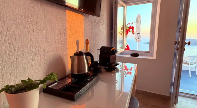 Коттедж с красивым видом из окна Sunset Caldera Seaview Houses