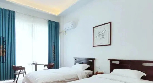 Suite 3 pokoje z widokiem Yiru Homestay (Zhouzuling Yaowangdong Wellness Town Scenic Area)