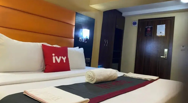 Exécutive chambre Aotel DawnCarrington Hotels & Suites