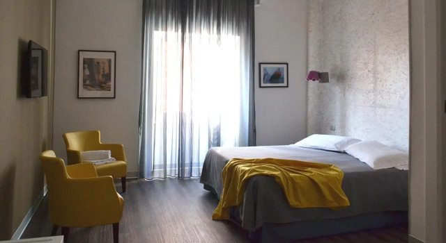 Кровать в общем номере Hotel Seiler