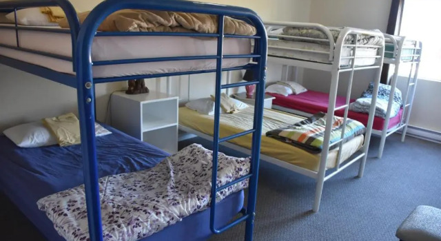 Кровать в общем номере North Coast Trail Backpackers Ltd