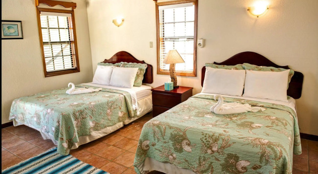 Blackbird Caye Resort, Foglalás Üdülőközpont Goffs Caye Belize Islands