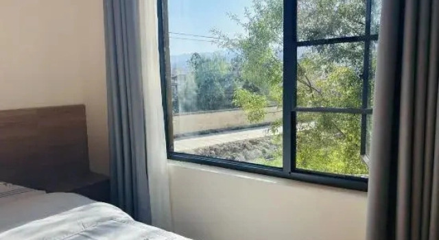 Семейный люкс с видом на реку Shaxi Wangjiangting Homestay