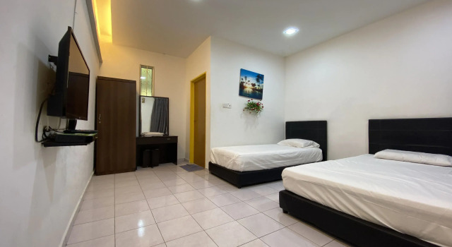 Трёхместный люкс Hotel O Taman Kota Homestay