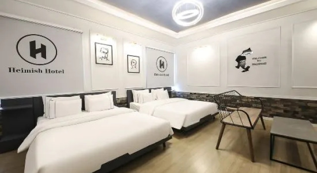 Четырёхместный семейный люкс Heimish Hotel