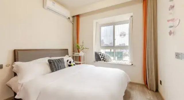 Кровать в общем номере Yu. Qifeng Homestay (Kuanzhaixiangzi Alleys)